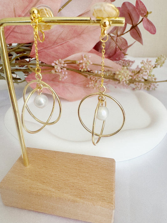 Gold hoop clip on earrings with pearls for sensitive ears. Clip on earrings for non-pierced ears