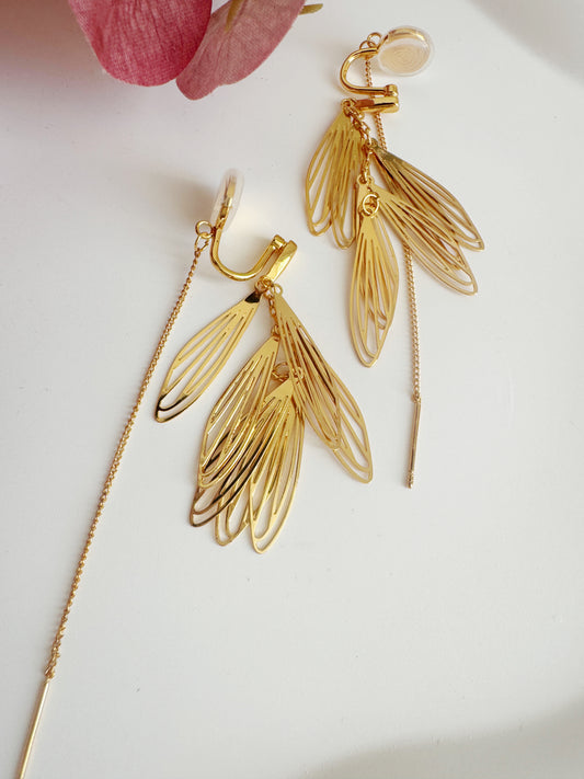Gold leaf-shaped ear clips